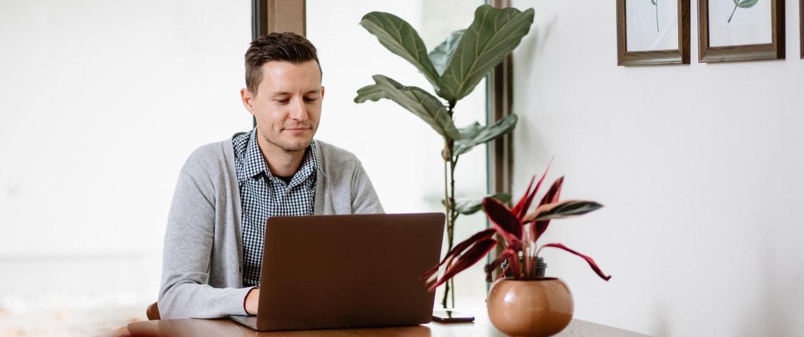 image of man using laptop